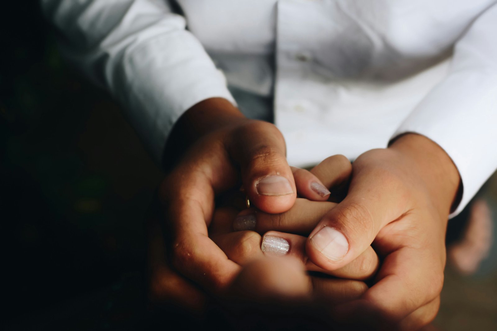Outpatient care holding hands